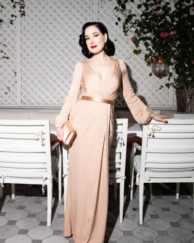 Dita Von Teese wearing a classic gown with a refined silhouette.