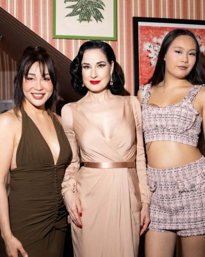 Dita Von Teese wearing a vintage-inspired deep red lip.