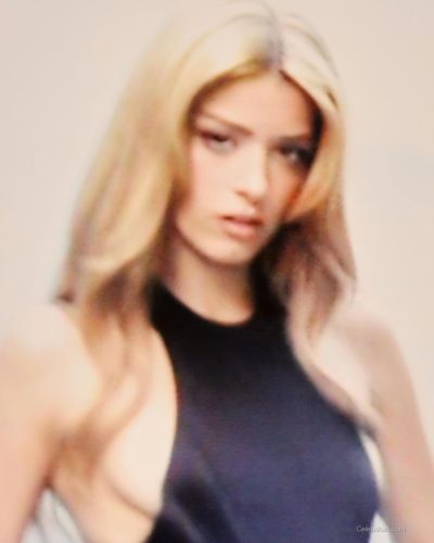 Dixie D'Amelio wearing bright red mini dress with puff sleeves