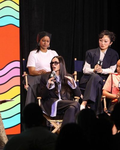 Eiza Gonzalez in bright red dress with soft beauty palette