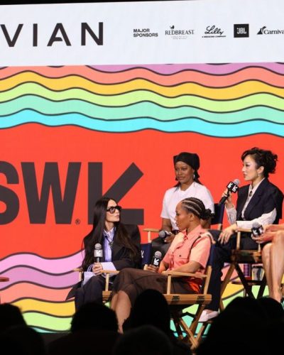 Eiza Gonzalez in eye-catching red gown with wavy hair