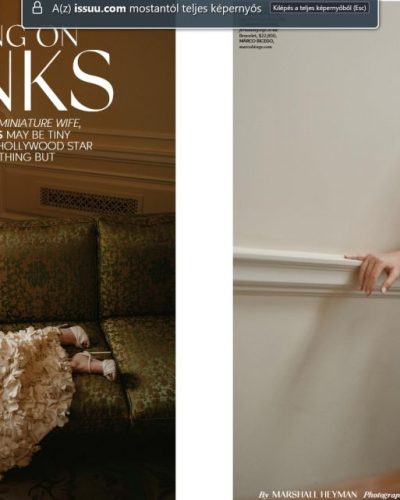 Elizabeth Banks stylish strappy heels in bold color to match dress