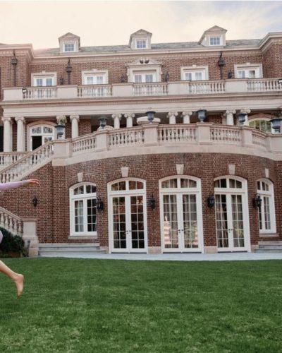 Elizabeth Banks bright patterned mini dress with sophisticated long sleeves