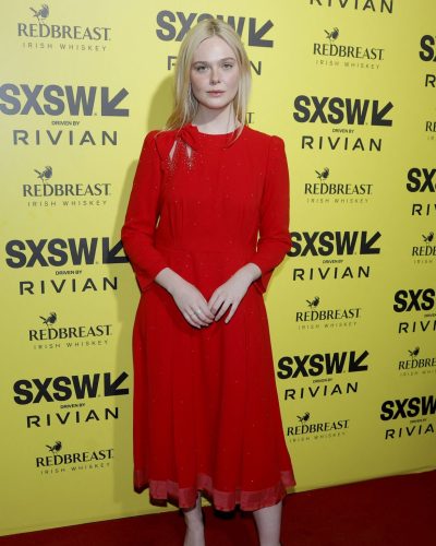 Elle Fanning in trendy red dress perfect for spring occasions