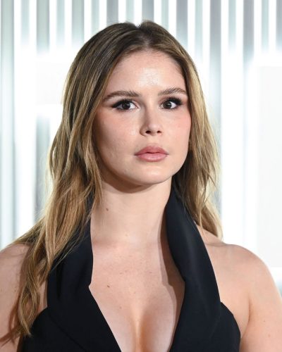 Erin Moriarty fitted black dress complemented by strappy heels