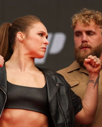 Gina Carano fitted black top and high-waisted jeans