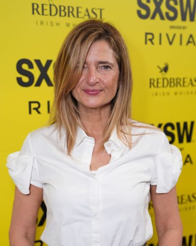 Gina Mingacci wearing stylish look at premiere 2026