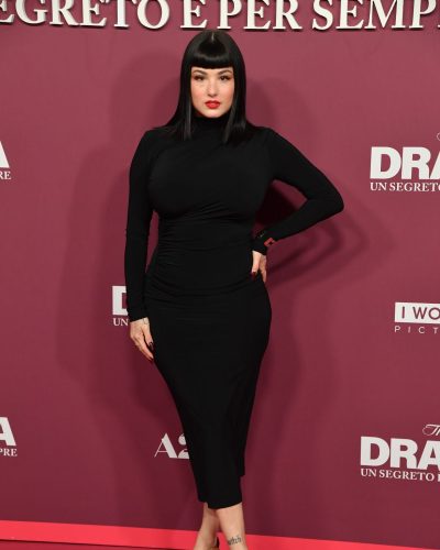 Giorgia Soleri sophisticated black dress with unique design elements