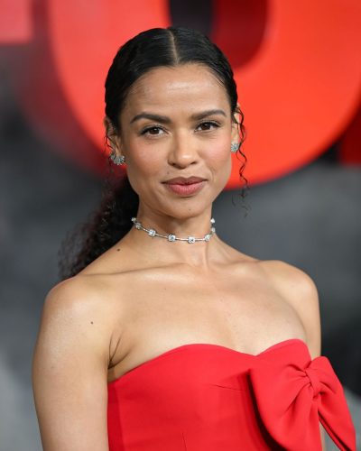 Gugu Mbatha-Raw bright red dress featuring side slit