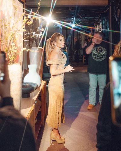 Hilary Duff in loose waves hairstyle with elegant ponytail