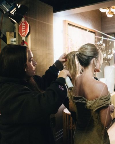 Hilary Duff in elegant beige gown with eye-catching neckline