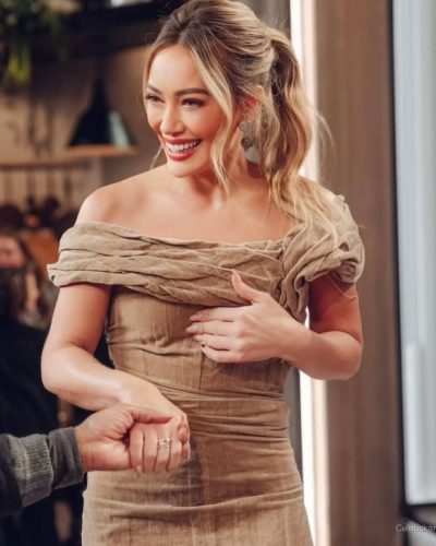 Hilary Duff wearing soft beige dress