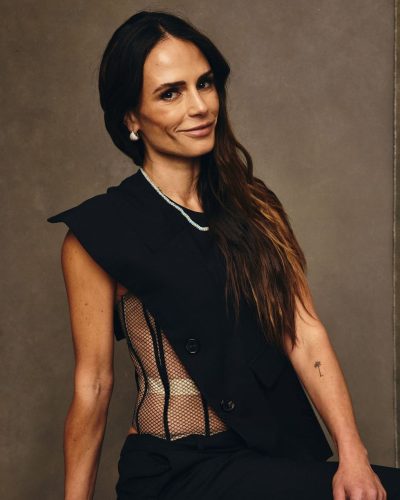 Jordana Brewster black dress featuring bold asymmetric elements