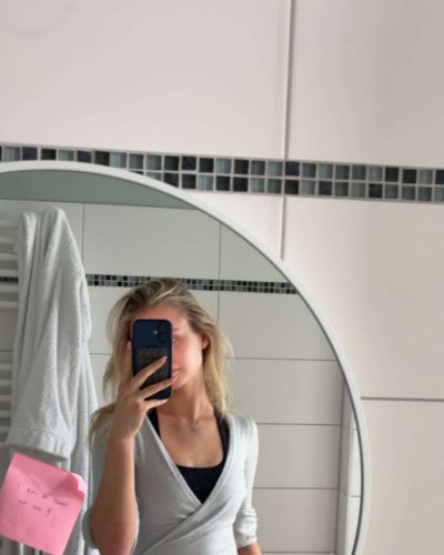 Jule Marie Jensen fashionable silver heels elevating her stature.