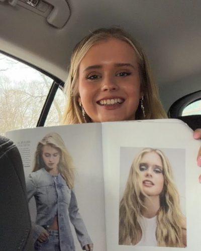 Jule Marie Jensen shimmering fabric dress captivating attention.