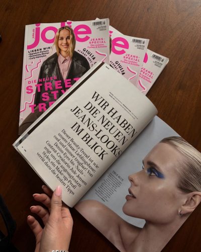 Jule Marie Jensen strappy silver heels complementing her dress.