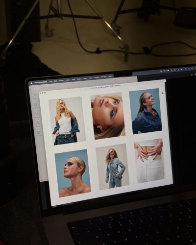 Jule Marie Jensen knee-length silver dress reflecting lights beautifully.