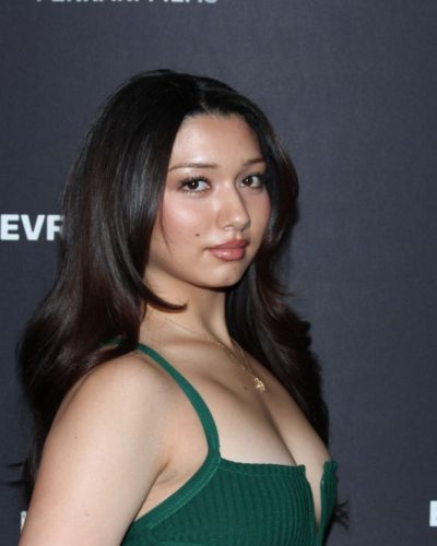 Julia Garcia in bright green gown accentuating her natural beauty