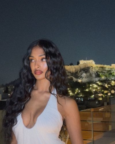 Kaaviya Sambasivam styled in black fitted top and relaxed trousers