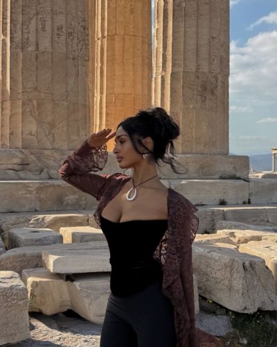 Kaaviya Sambasivam in versatile black top and fashionable trousers