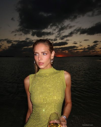 Kari Riley in a brown bikini radiating serene summer style.