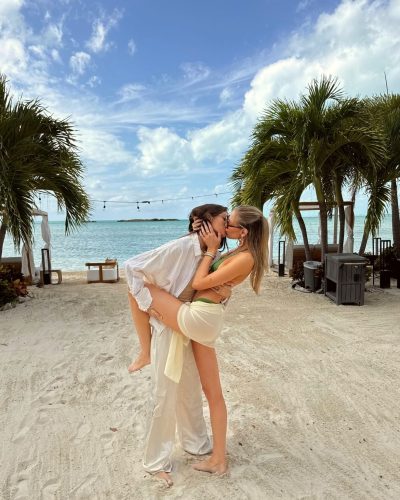 Kari Riley in a chic brown bikini enjoying beach vibes.