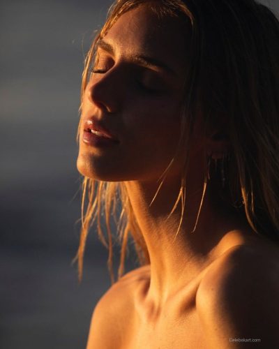 Kari Riley wearing comfortable beach attire for casual day.