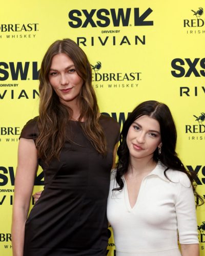 Karlie Kloss classic black dress featuring understated accessories