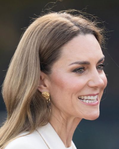 Kate Middleton chic off-white dress layered with tailored coat