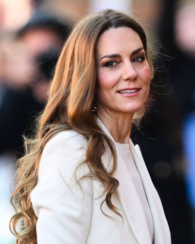 Kate Middleton statement earrings with intricate gold detailing