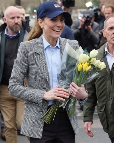 Kate Middleton in checkered blazer and light blue button-up shirt
