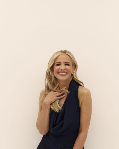 Sarah Michelle Gellar stylish navy halter top and tailored trousers