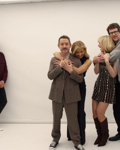 Kathryn Newton chic brown dress with modern bead design