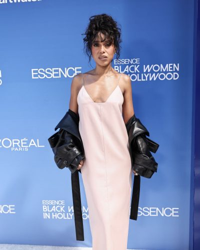 Kerry Washington wearing a delicate pink V-neck dress