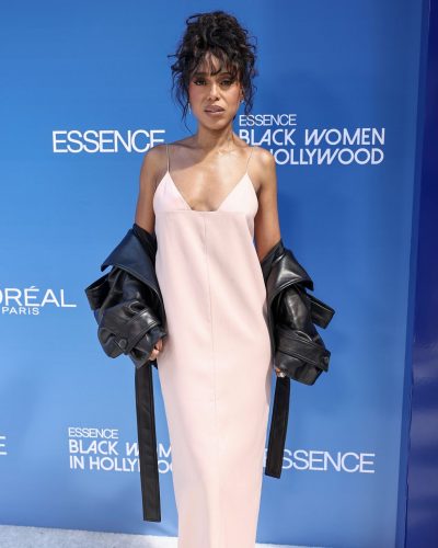 Kerry Washington styled with minimal accessories and stud earrings