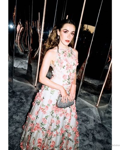 Kiernan Shipka lively pink gown featuring floral embellishments