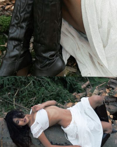 Komal Ilsanker in a fitted black gown featuring intricate patterns