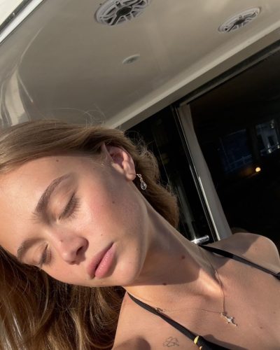 Kyla Dodds shimmering dress with playful charm and rich fabric