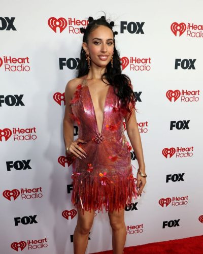 Kylie Cantrall floral fringe dress flowing gracefully