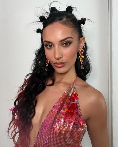 Kylie Cantrall sporting a vibrant gown with intricate embellishments