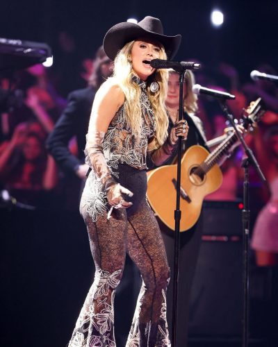 Lainey Wilson black lace fitted top with floral embroidery