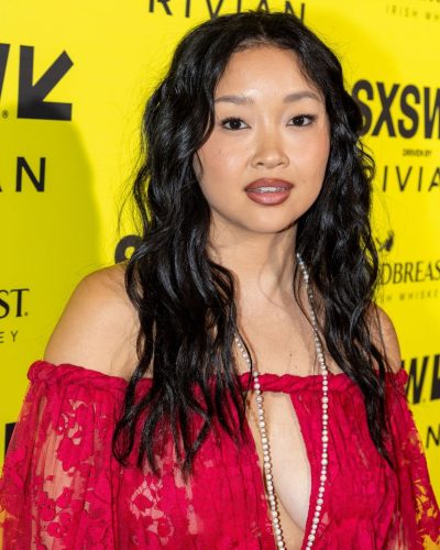 Lana Condor in soft peach dress with flowing layers