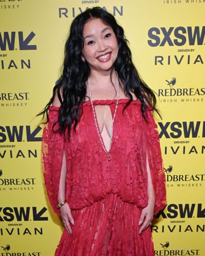 Lana Condor in chic red gown with modern cut