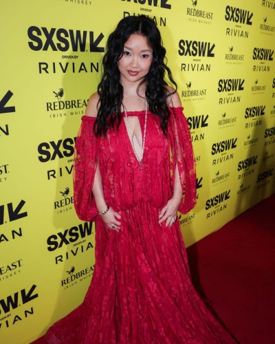 Lana Condor in loose lavender gown with soft fabric draping