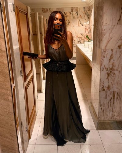 Lesley-Ann Brandt in a blue maxi dress with floral print