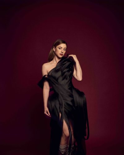 Lili Reinhart eye-catching yellow dress with playful floral elements