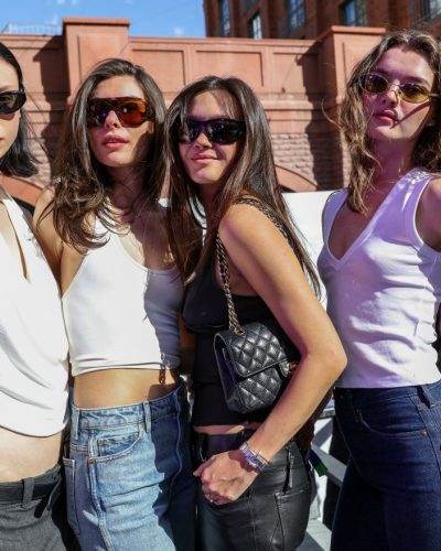 Lily Chee fashionable black sunglasses reflecting winter sun