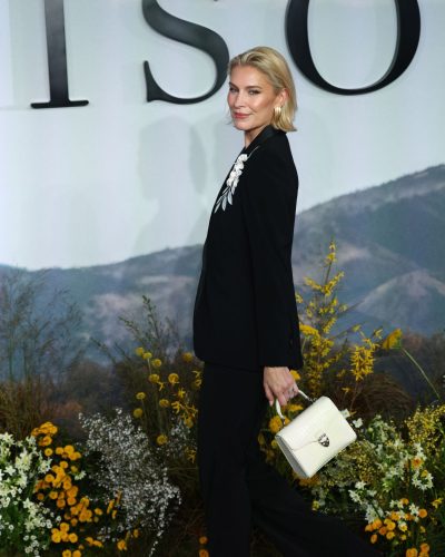 Louise Boyce modern black suit with intricate floral accents