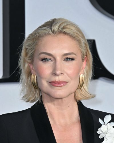 Louise Boyce black floral lapel blazer and handbag