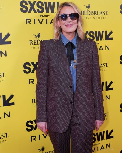 Lucy Forbes wearing stylish look at premiere 2026